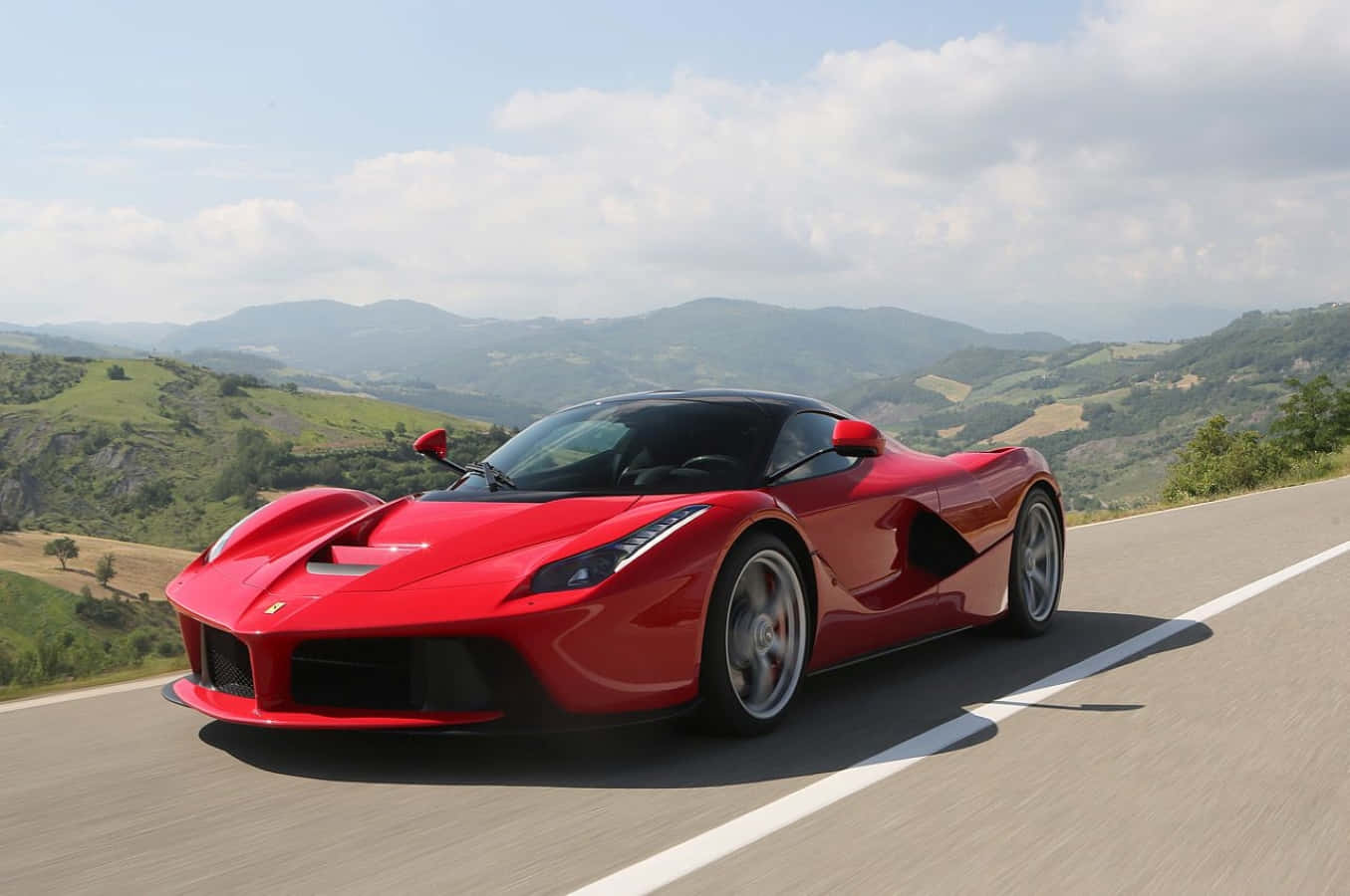 Stunning Ferrari Laferrari In Vibrant Red Wallpaper