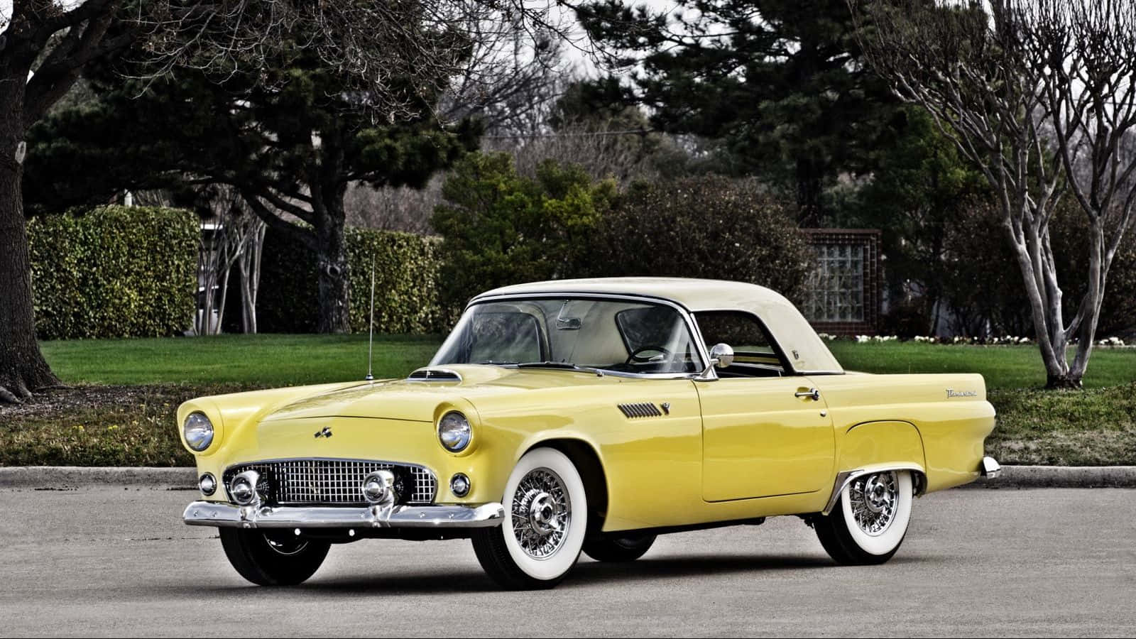 Stunning Ford Thunderbird Cruising Down The Highway Wallpaper