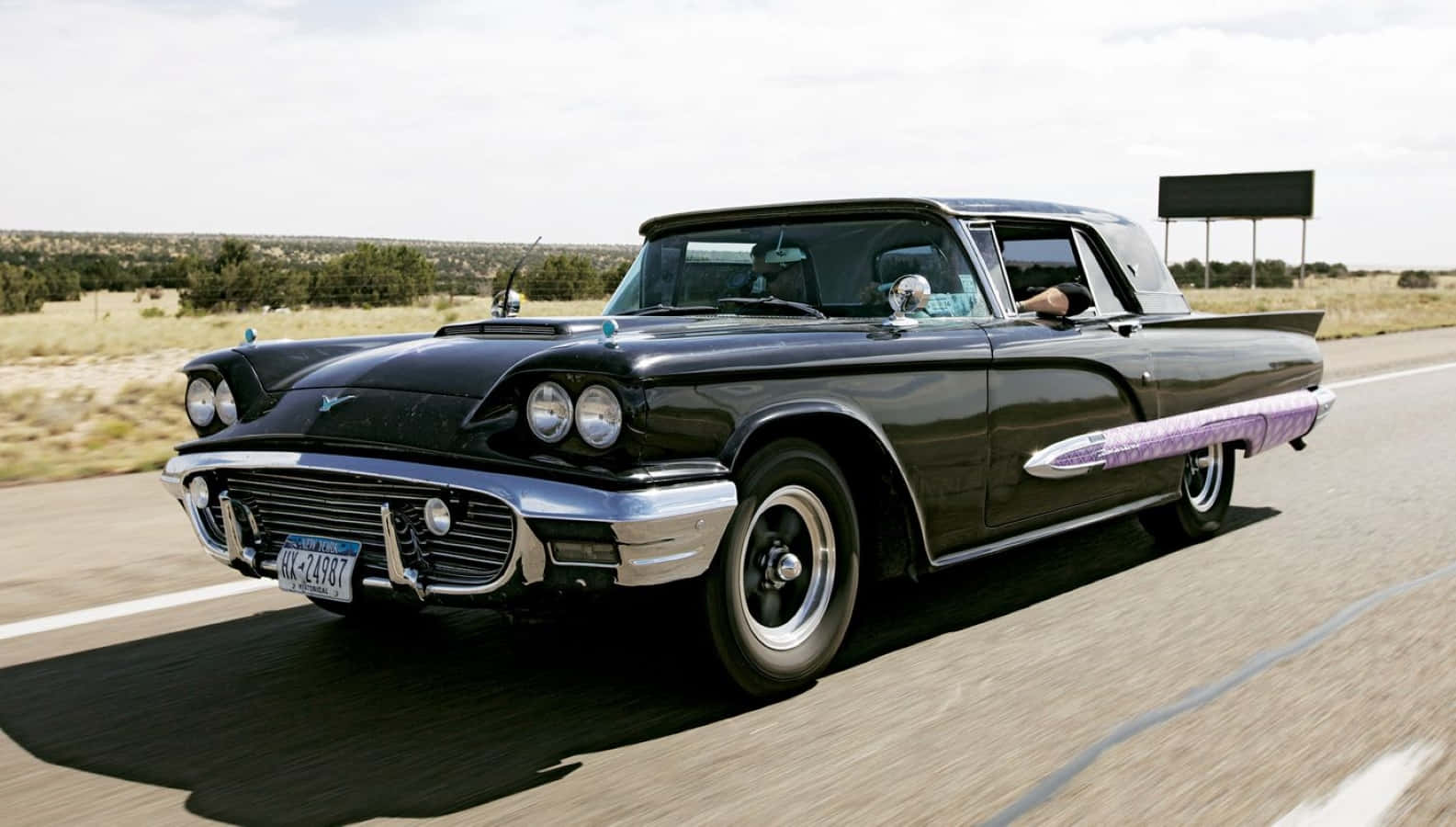 Stunning Ford Thunderbird On The Open Road Wallpaper