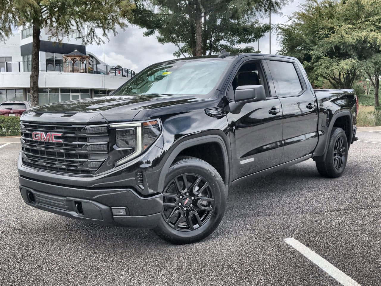 Stunning Gmc Sierra In A Picturesque Landscape Wallpaper