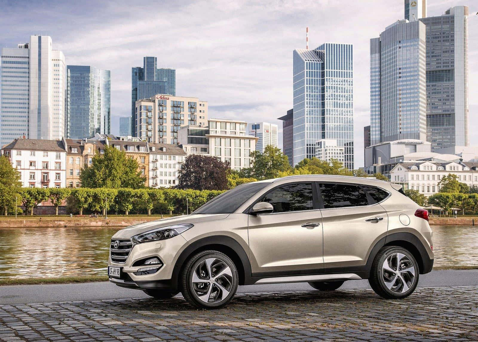 Stunning Hyundai Tucson In A Beautiful Landscape Wallpaper