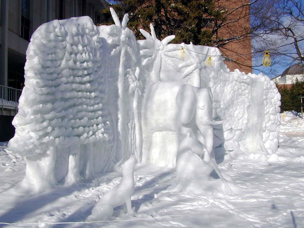 Stunning Ice Sculpture Depicting Swans Wallpaper