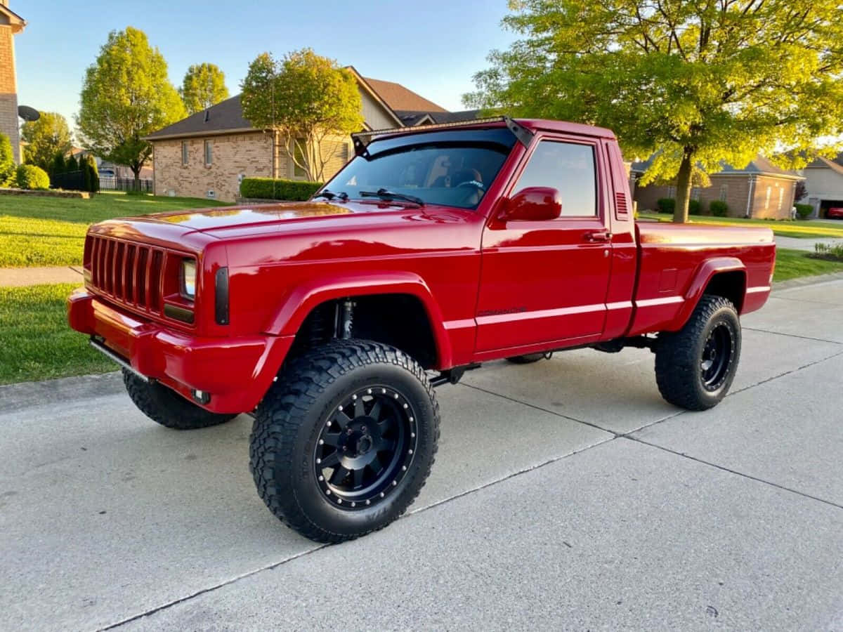 Stunning Jeep Comanche Conquering The Great Outdoors Wallpaper