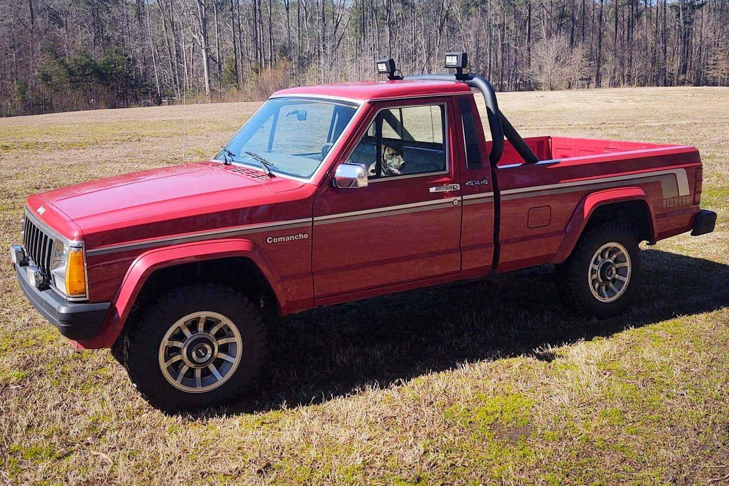 Stunning Jeep Comanche Showcasing Its Rugged Off-road Capabilities Wallpaper