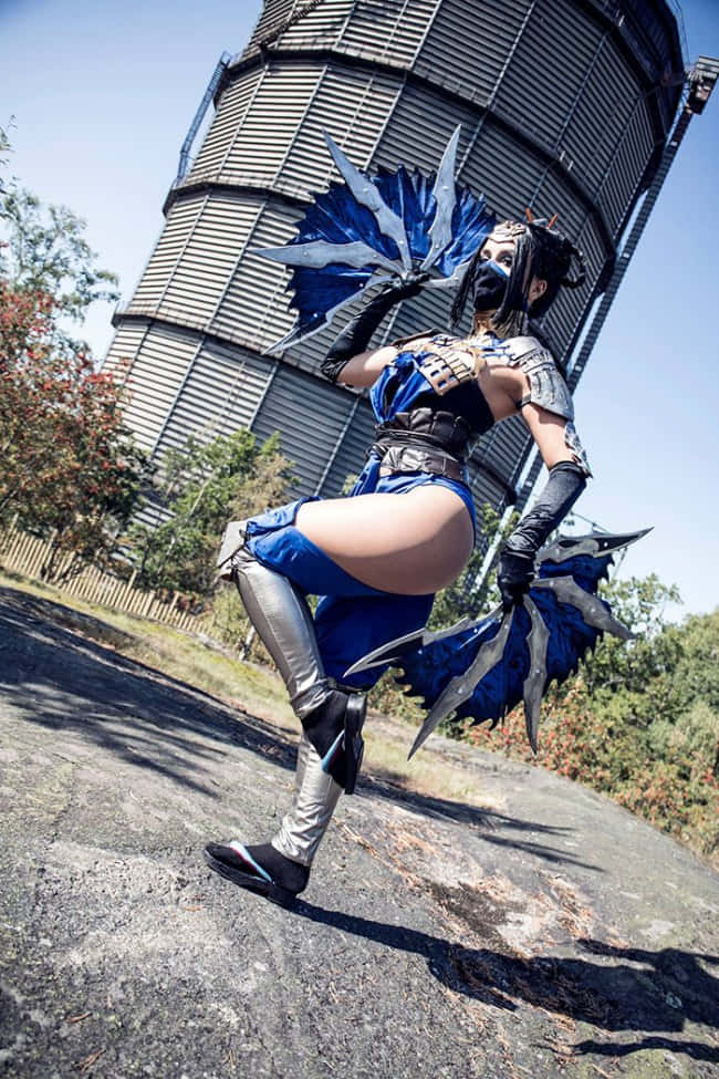 Stunning Kitana In Action From Mortal Kombat Wallpaper