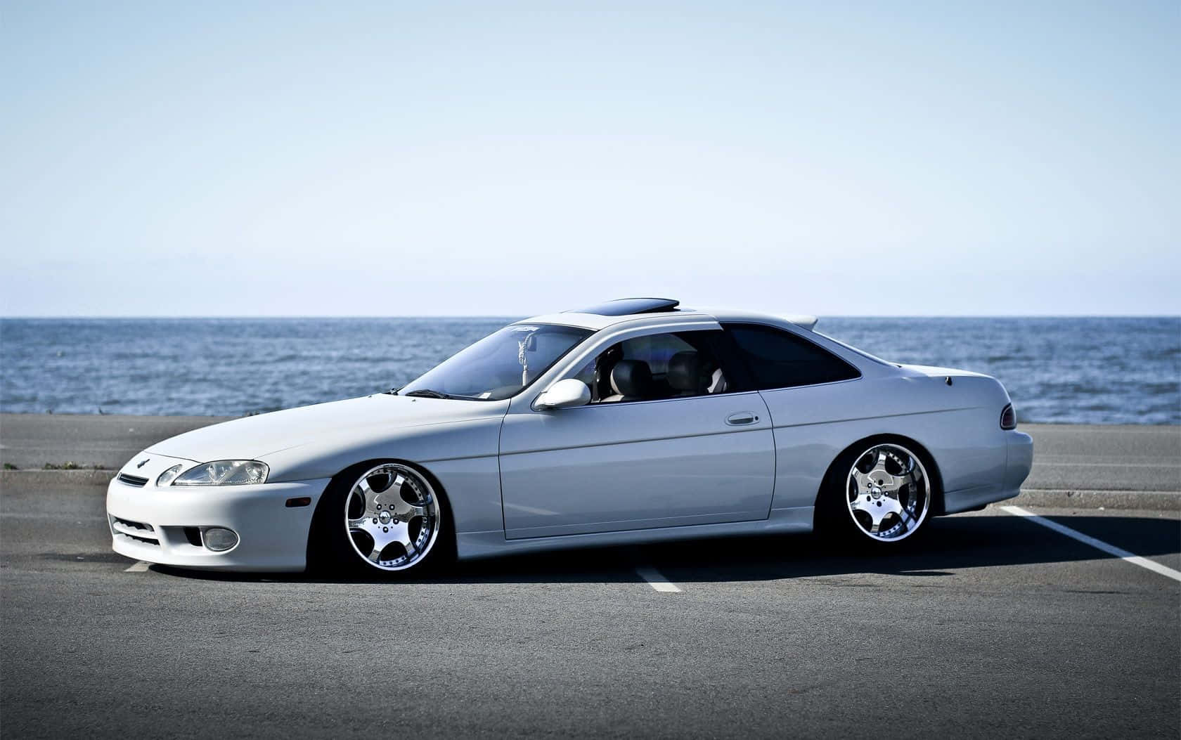 Stunning Lexus Sc 300 In Motion Wallpaper