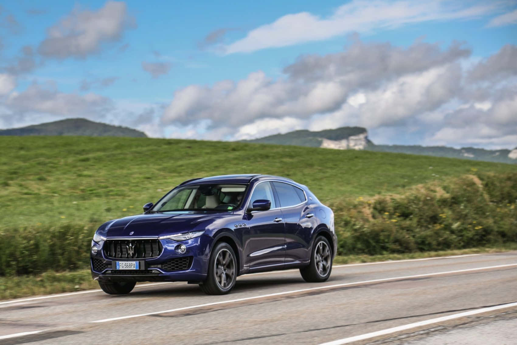 Stunning Maserati Levante In A Breathtaking Landscape Wallpaper