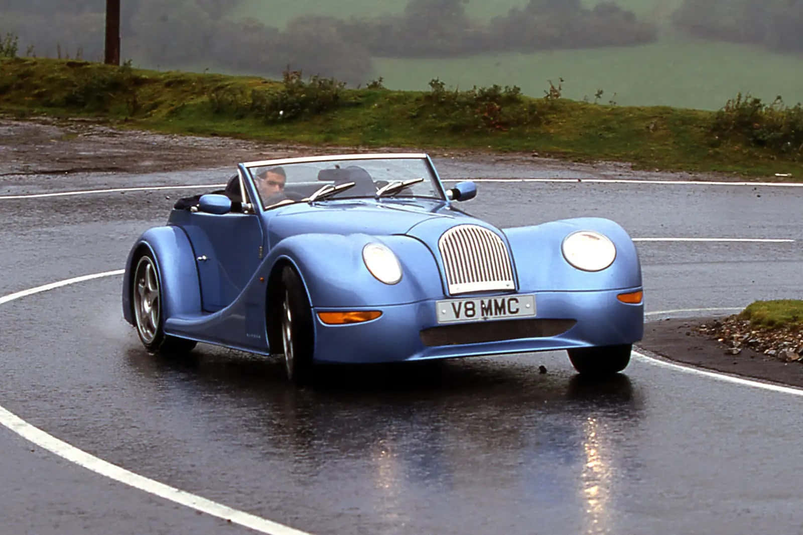 Stunning Morgan Aero 8 On An Open Road Wallpaper