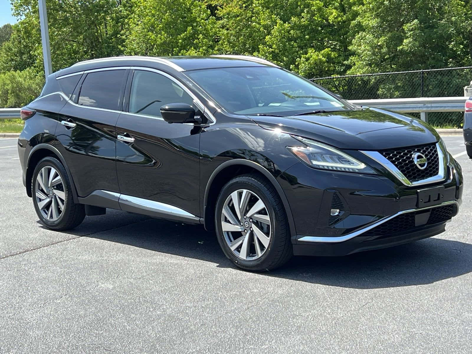 Stunning Nissan Murano Cruising On The Open Road Wallpaper