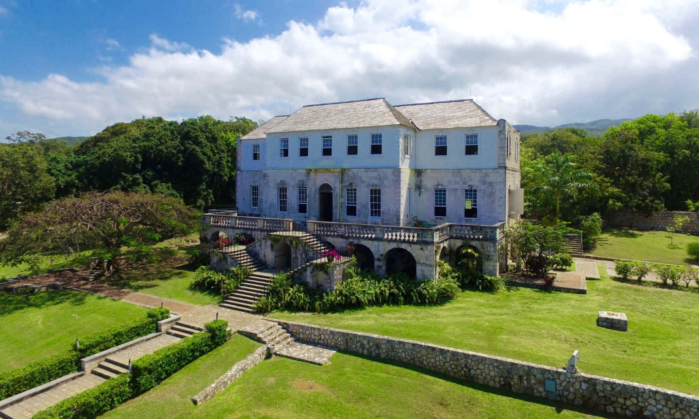 Stunning Overview Of Rose Hall Great House And Surrounding Scenery Wallpaper