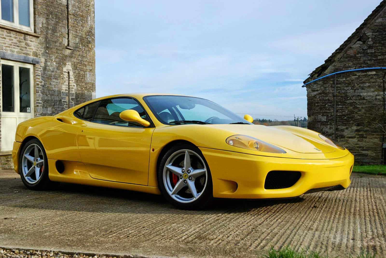 Stunning Red Ferrari 360 Modena In Motion Wallpaper