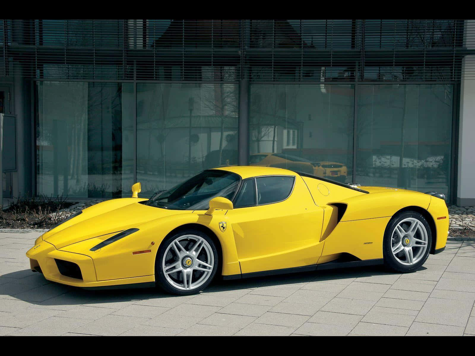 Stunning Red Ferrari Enzo On The Go Wallpaper