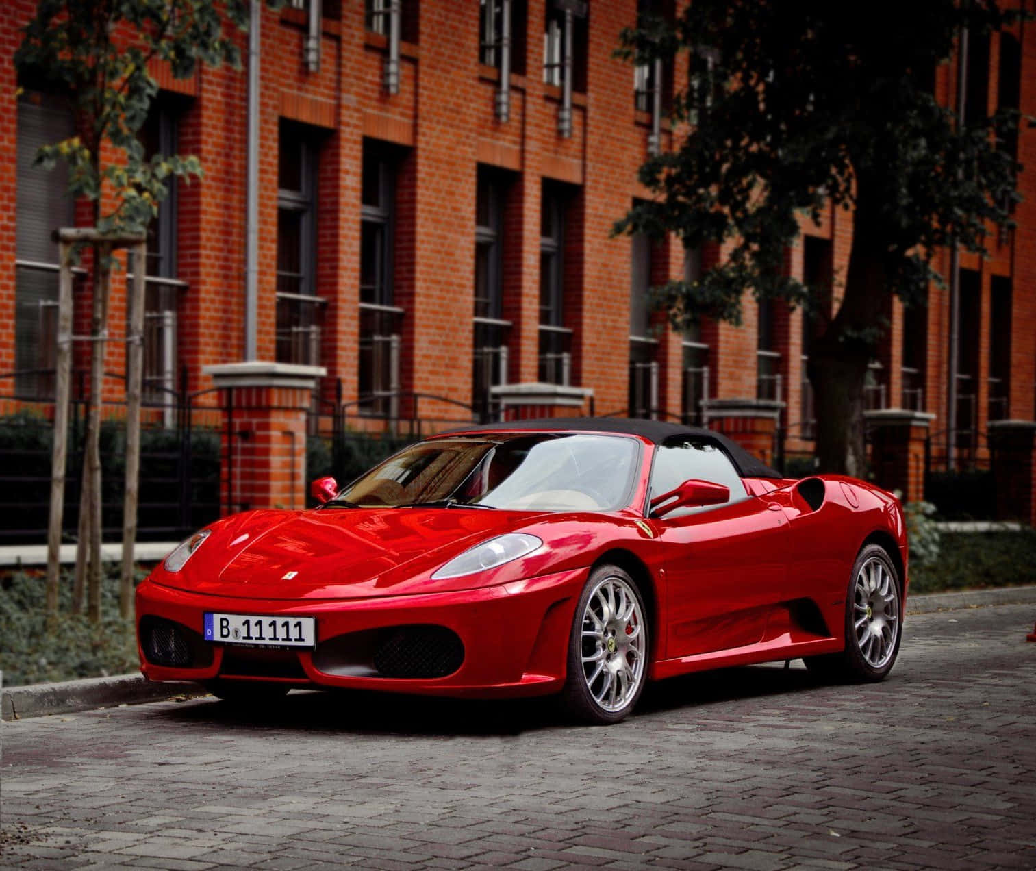 Stunning Red Ferrari F430 In Action Wallpaper