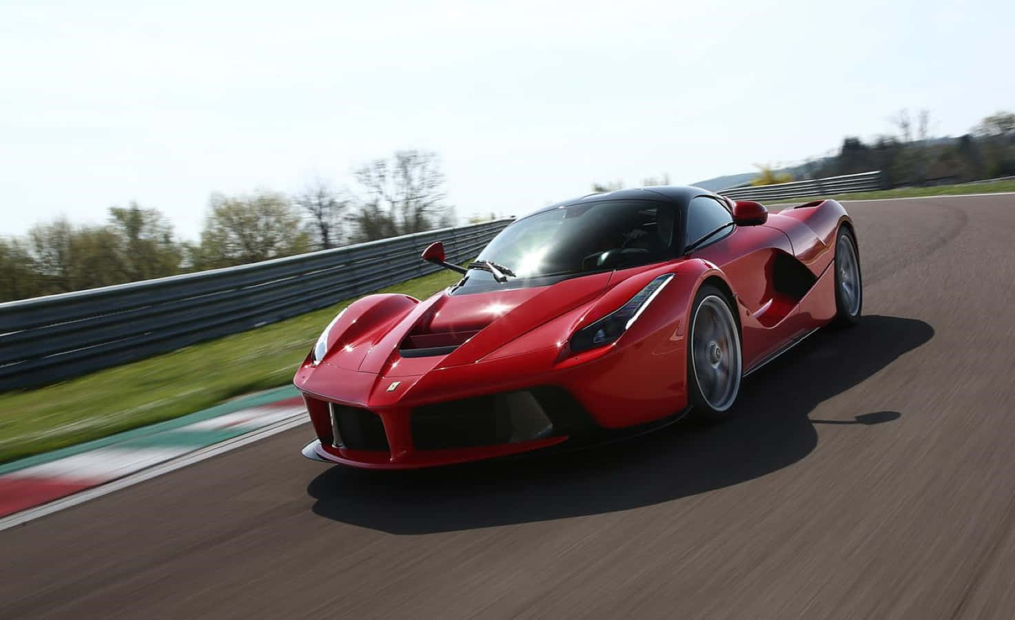 Stunning Red Ferrari Laferrari In Action Wallpaper