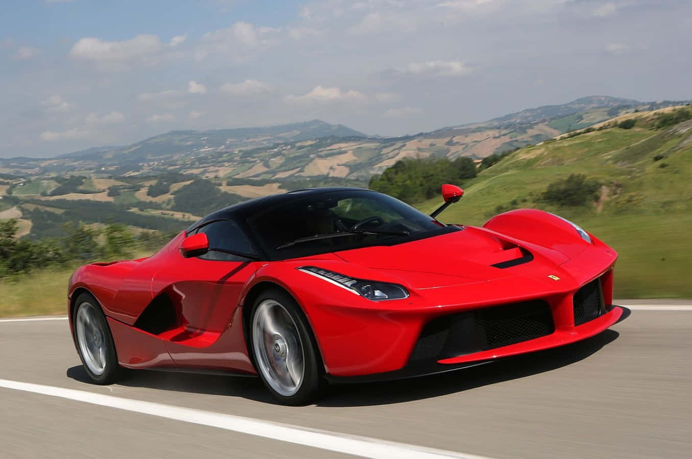 Stunning Red Ferrari Laferrari In Motion Wallpaper