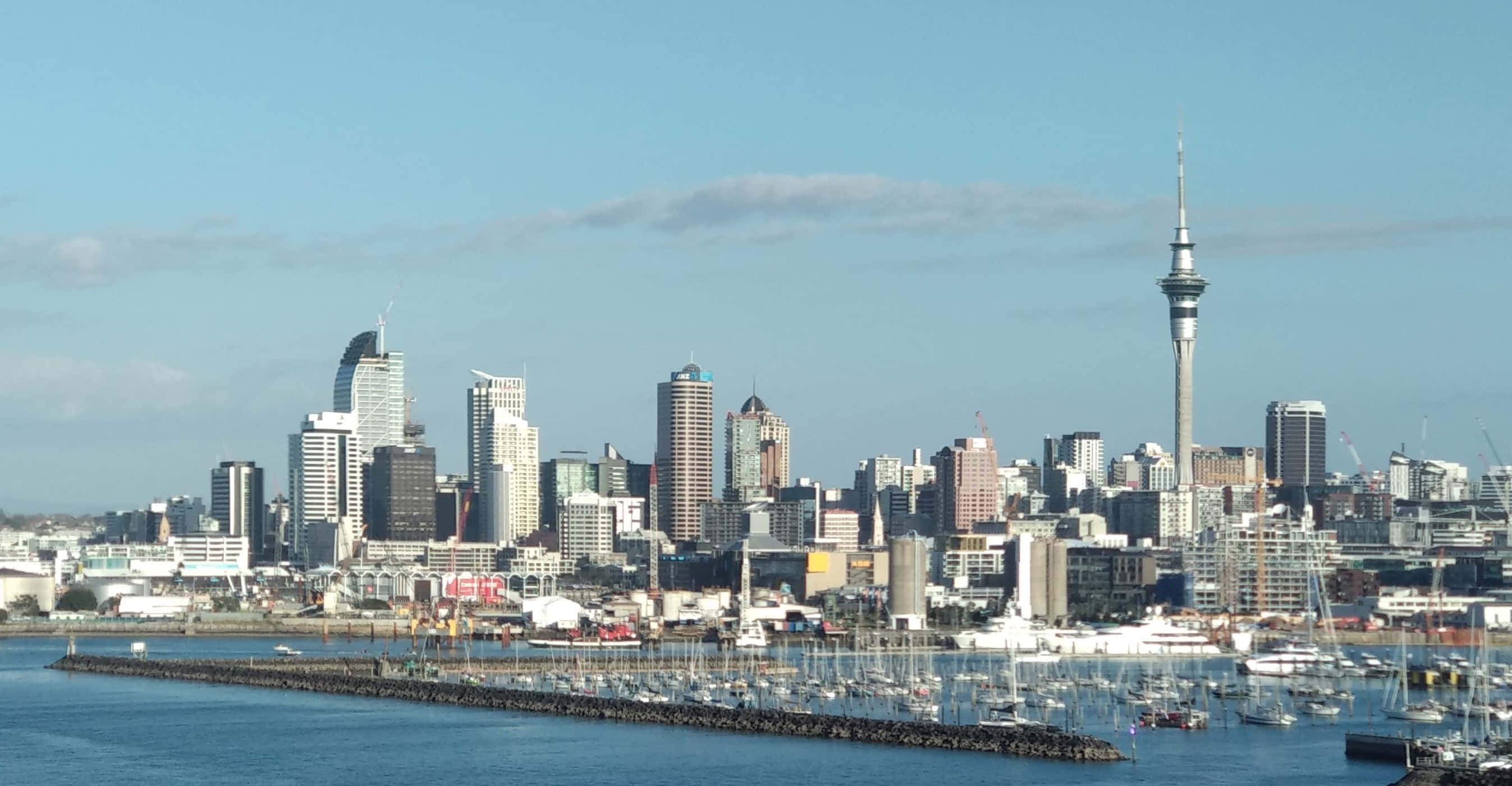 Stunning Skyline Of Auckland At Sunset Wallpaper