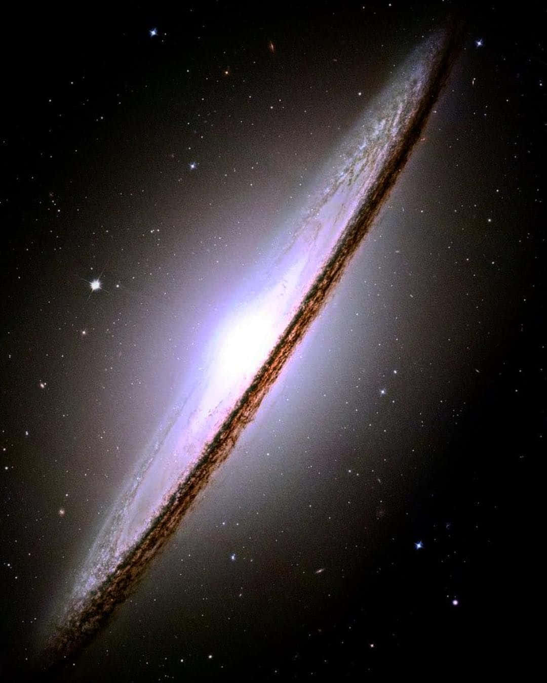 Stunning Sombrero Galaxy In Deep Space Wallpaper