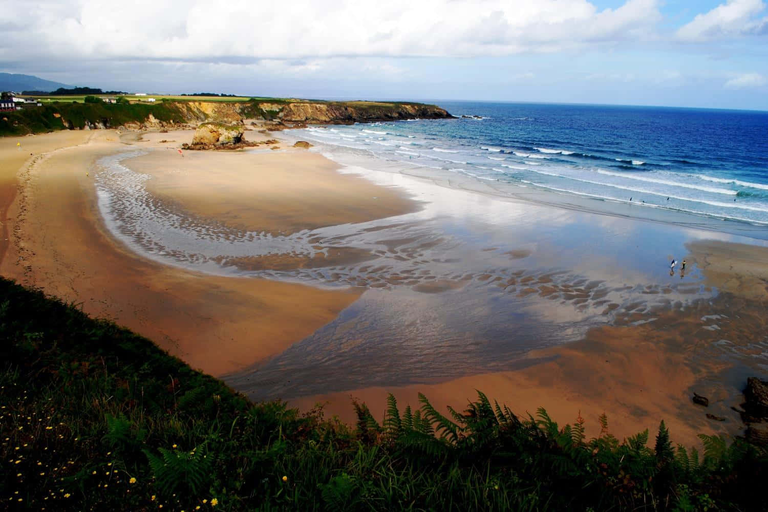 Stunning Spanish Beach With Crystal Blue Waters Wallpaper