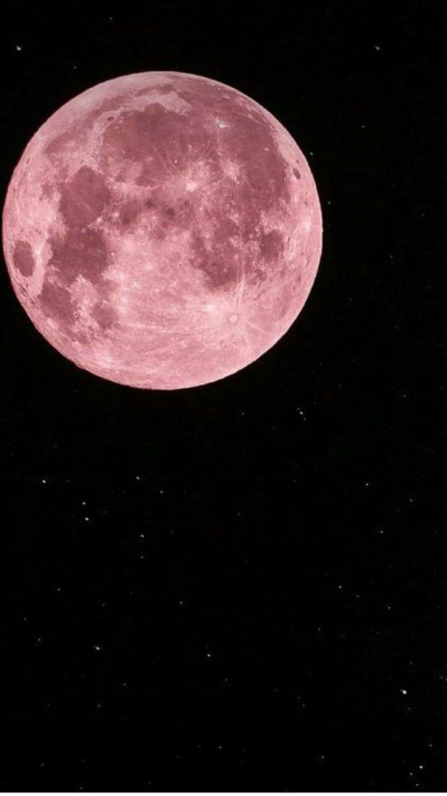 Stunning Strawberry Moon Illuminating The Night Sky Wallpaper