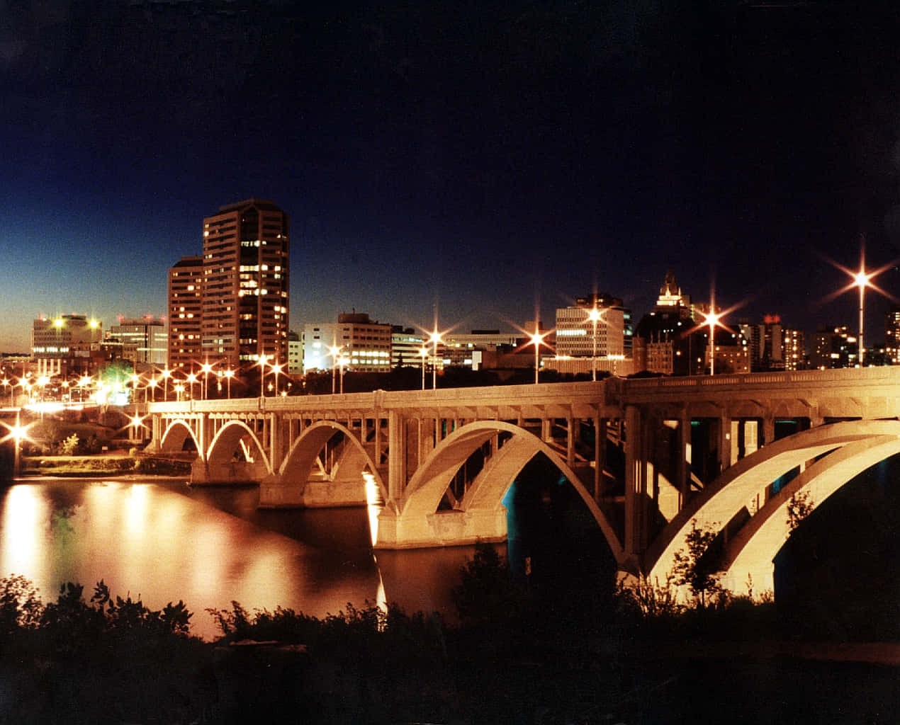 Stunning Sunset Over Saskatoon Skyline Wallpaper