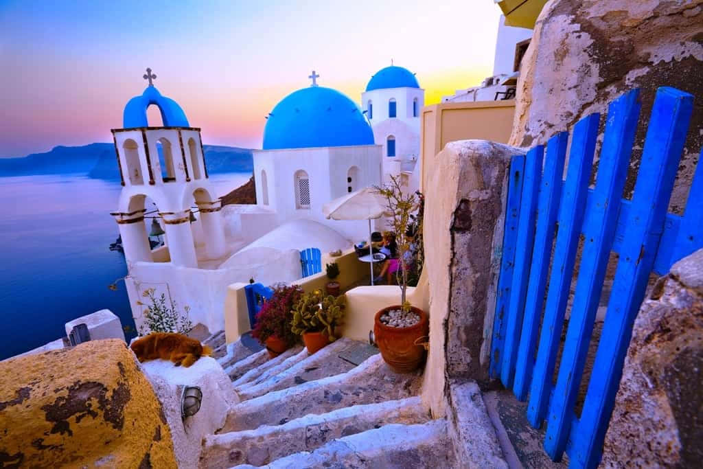 Stunning View Of A Greek Island Village By The Sea Wallpaper