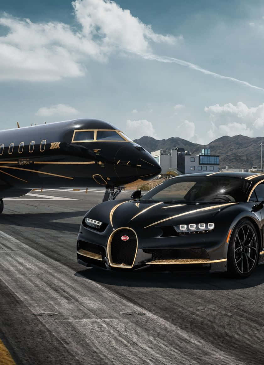 Stunning View Of A Private Jet And Car Wallpaper