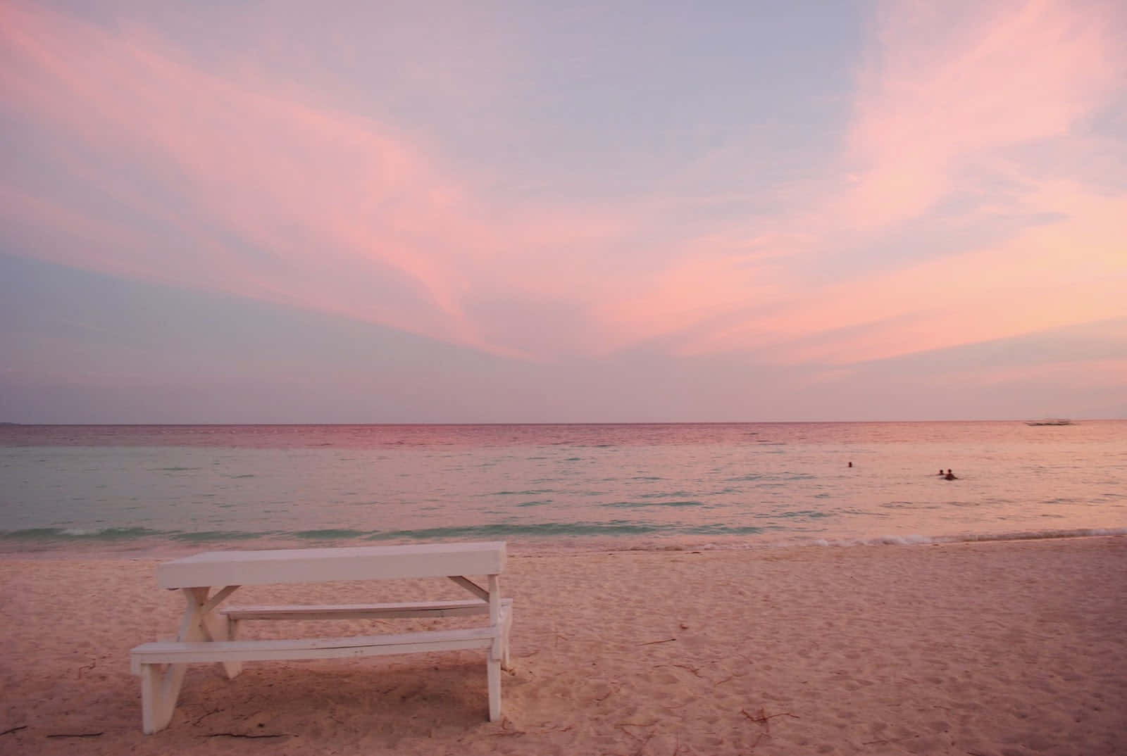 Stunning View Of Pink Sand Beach At Sunset Wallpaper