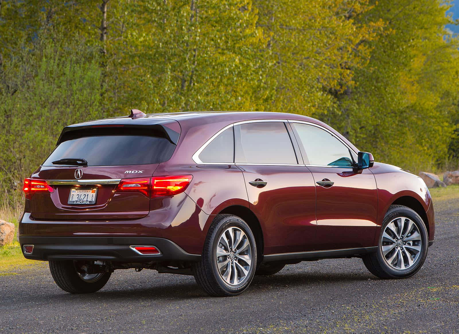 Stunning White Acura Mdx On The Open Road Wallpaper