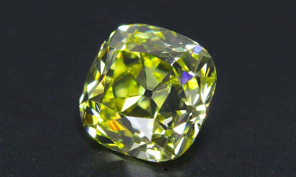 Stunning Yellow Diamond On A Black Background Wallpaper