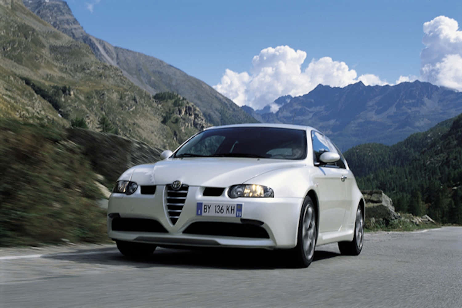 Stylish Alfa Romeo 147 On The Road Wallpaper