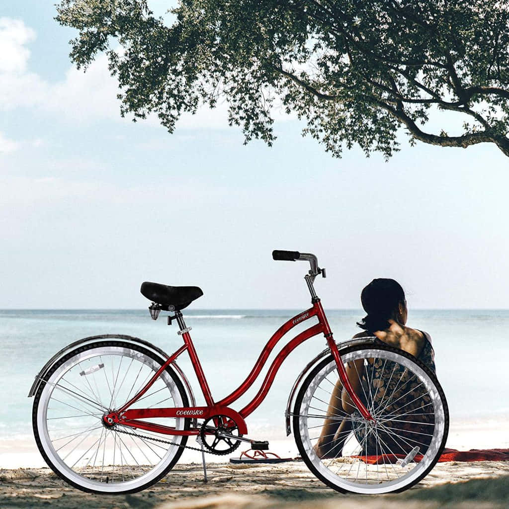 Stylish Beach Cruiser On Sandy Shore Wallpaper