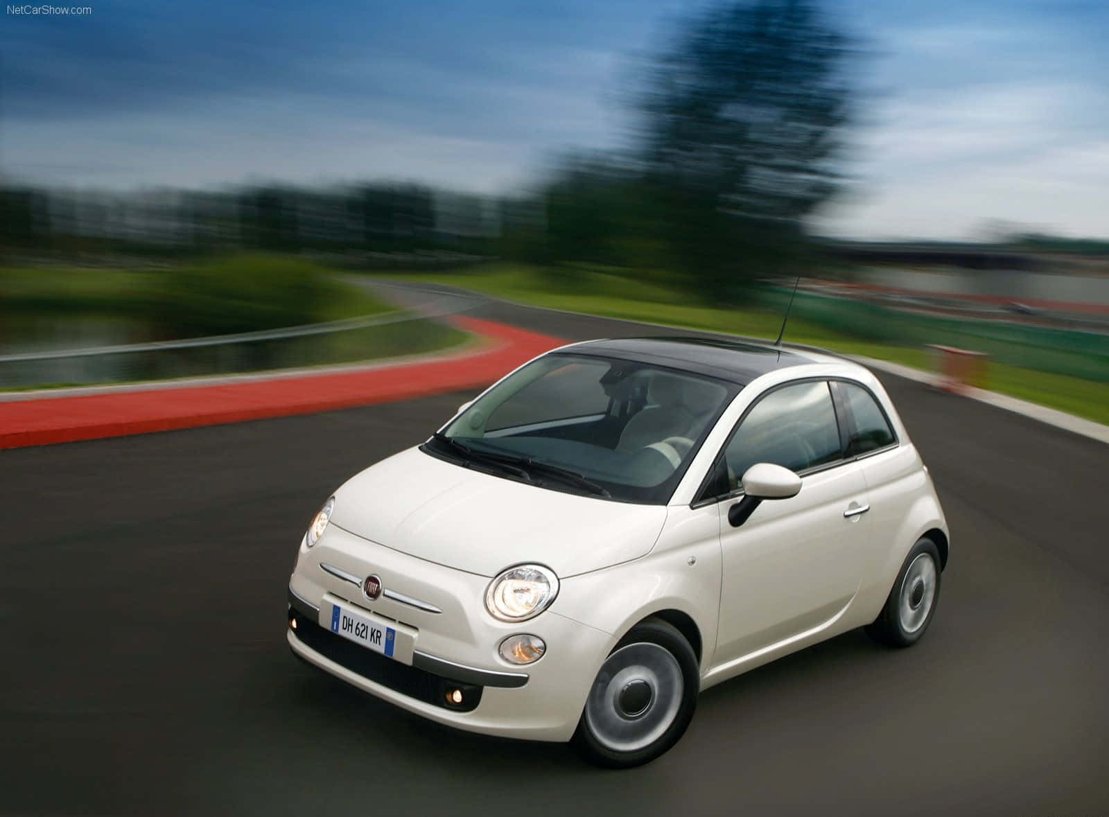 Stylish Fiat 500l On The Open Road Wallpaper