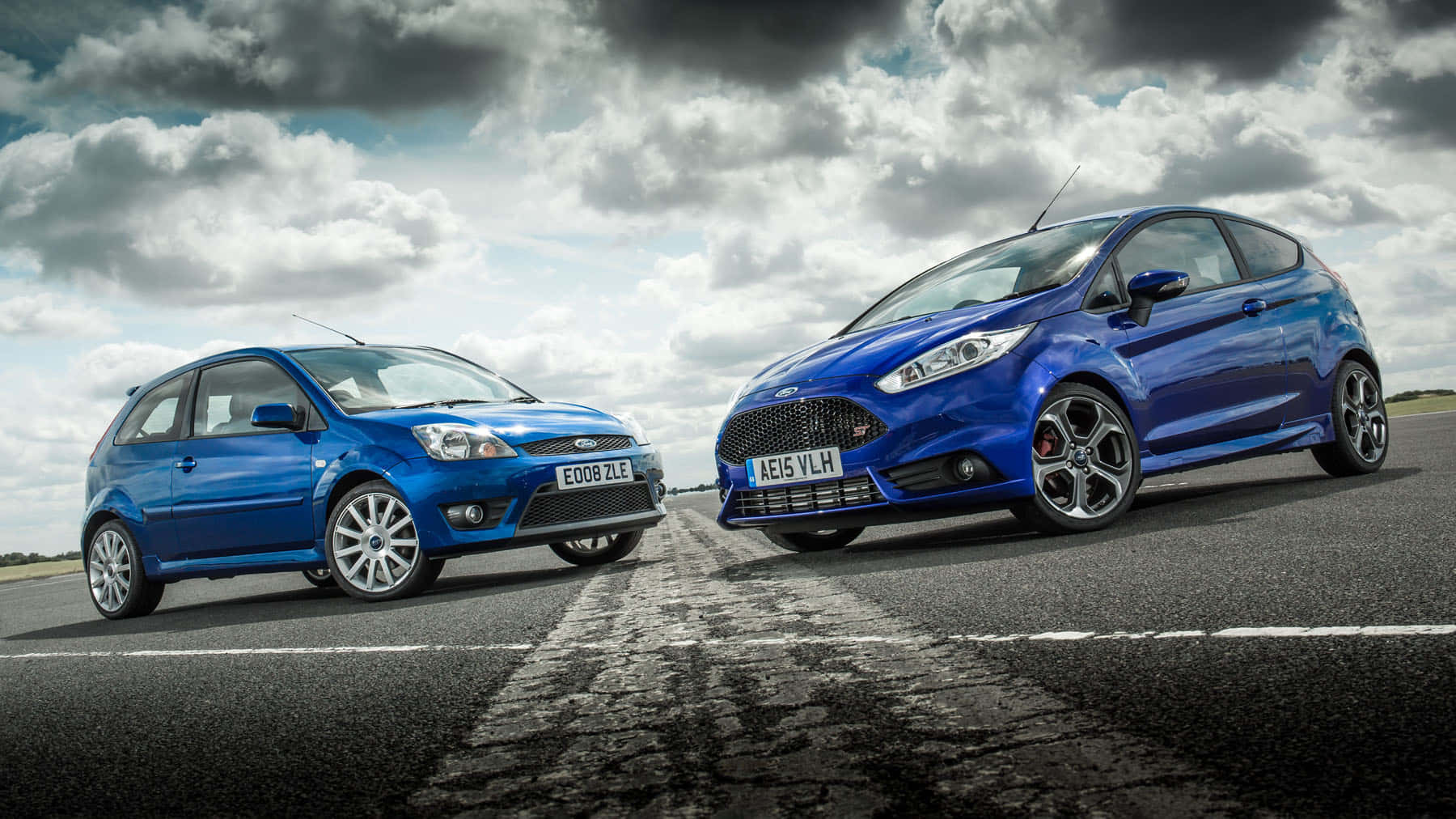 Stylish Ford Fiesta On A Scenic Road Wallpaper