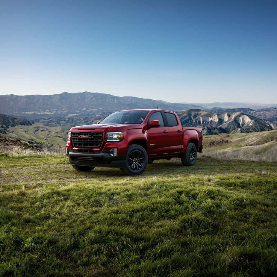 Stylish Gmc Canyon Parked Outdoors Wallpaper