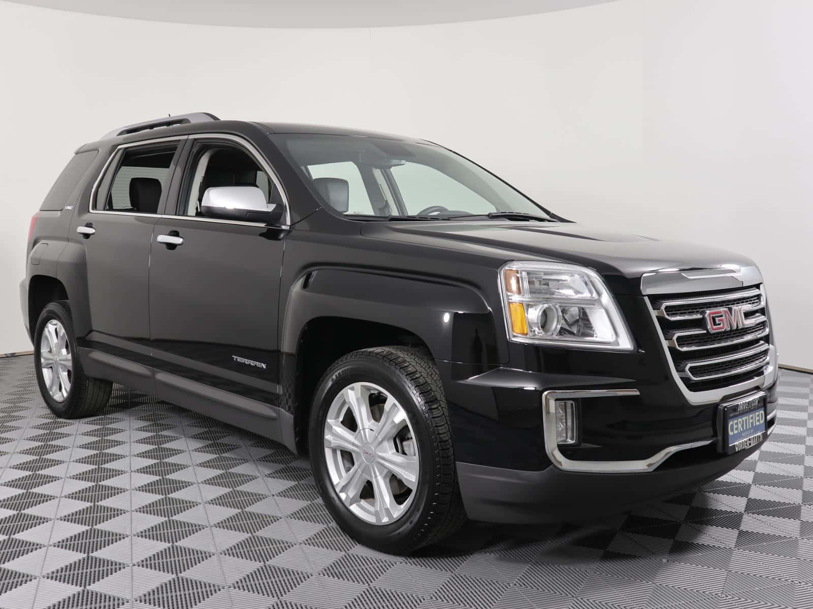 Stylish Gmc Terrain Cruising On The Highway Wallpaper