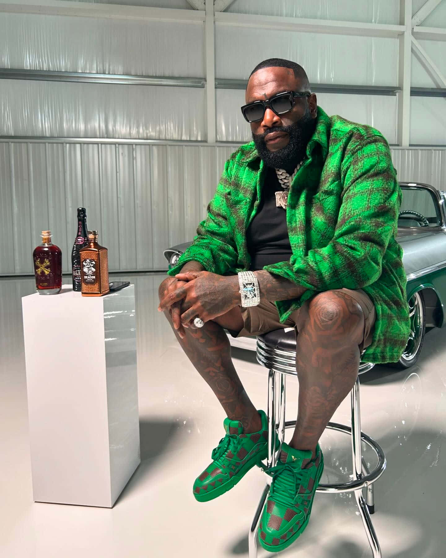 Stylish Green Ensemble Rick Ross Wallpaper