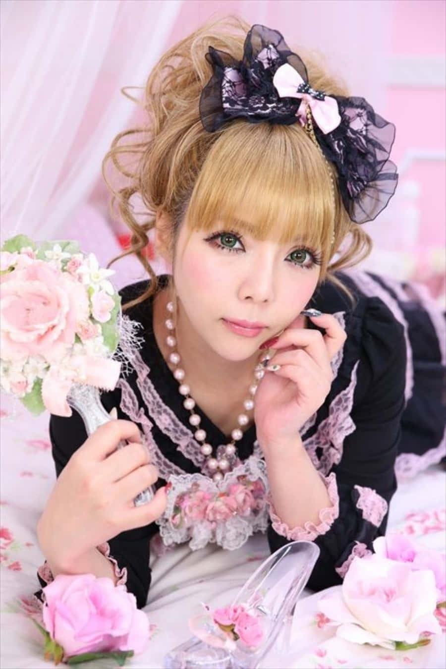 Stylish Gyaru Girl Posing For The Camera In Trendy Outfit Wallpaper