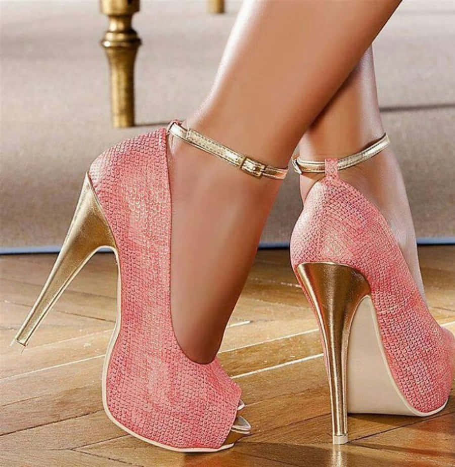 Stylish Pink Shoes For A Fashion Statement Wallpaper