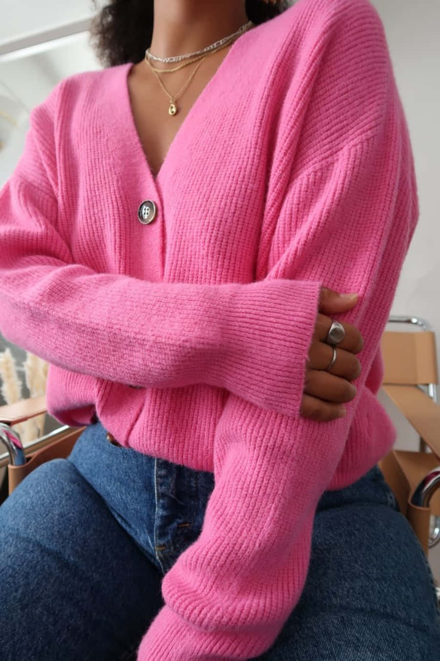 Stylish Pink Sweater On A Hanger Wallpaper