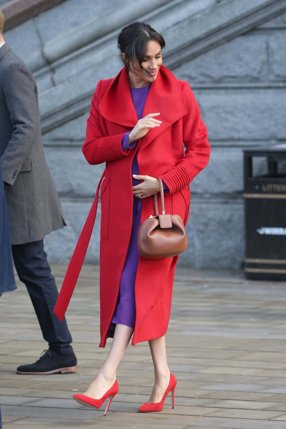 Stylish Red Coat On A Hangar Wallpaper