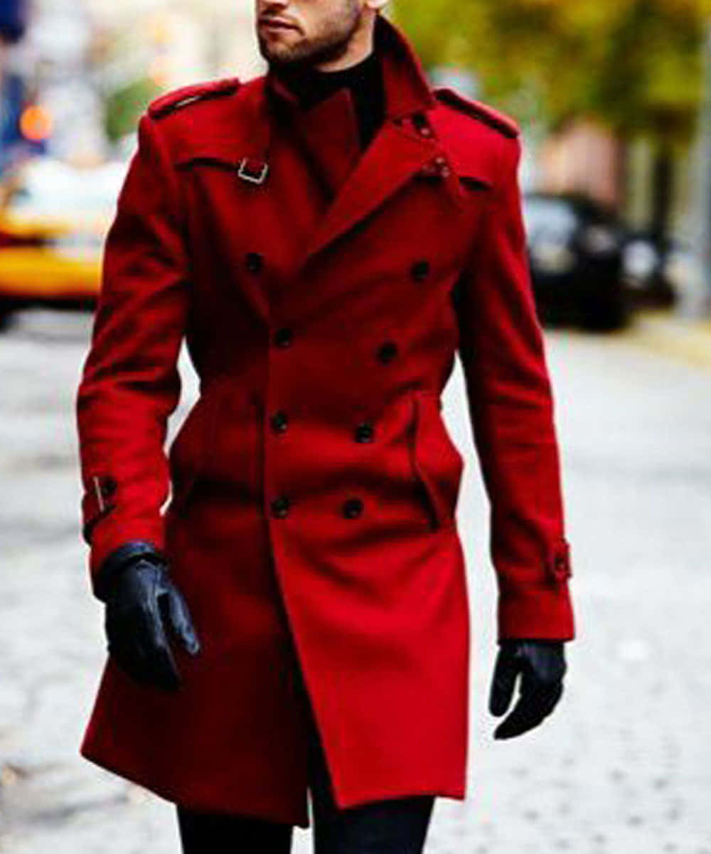 Stylish Woman Wearing A Vibrant Red Coat In An Autumn Park. Wallpaper