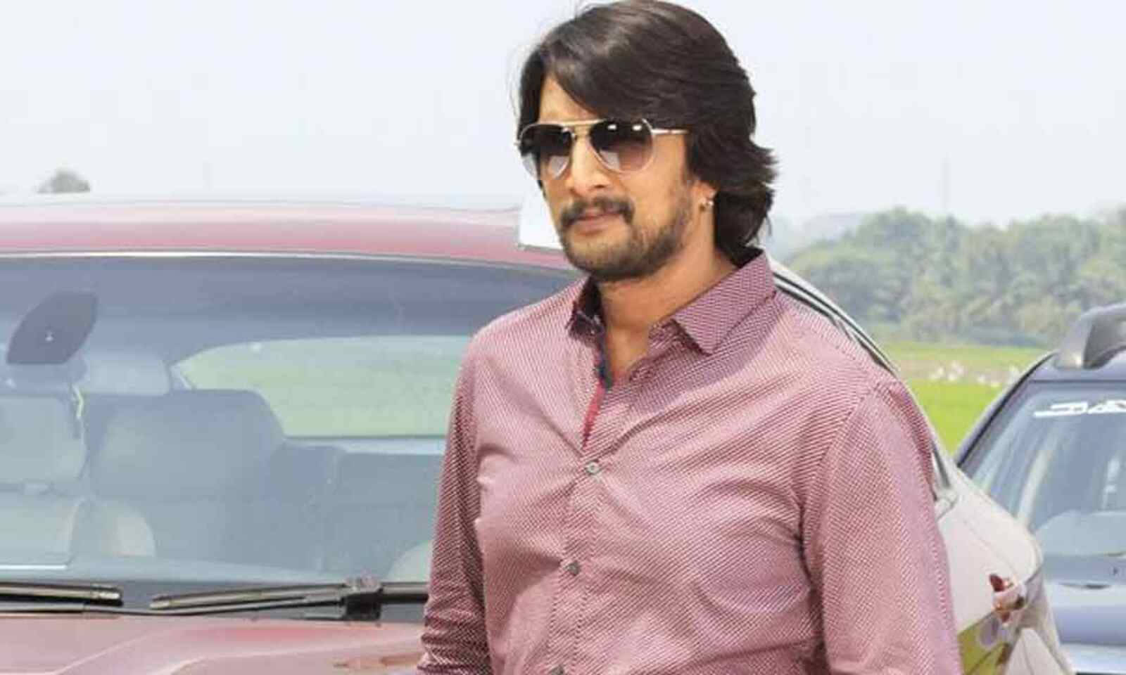 Sudeep Wearing Pink Polo Wallpaper