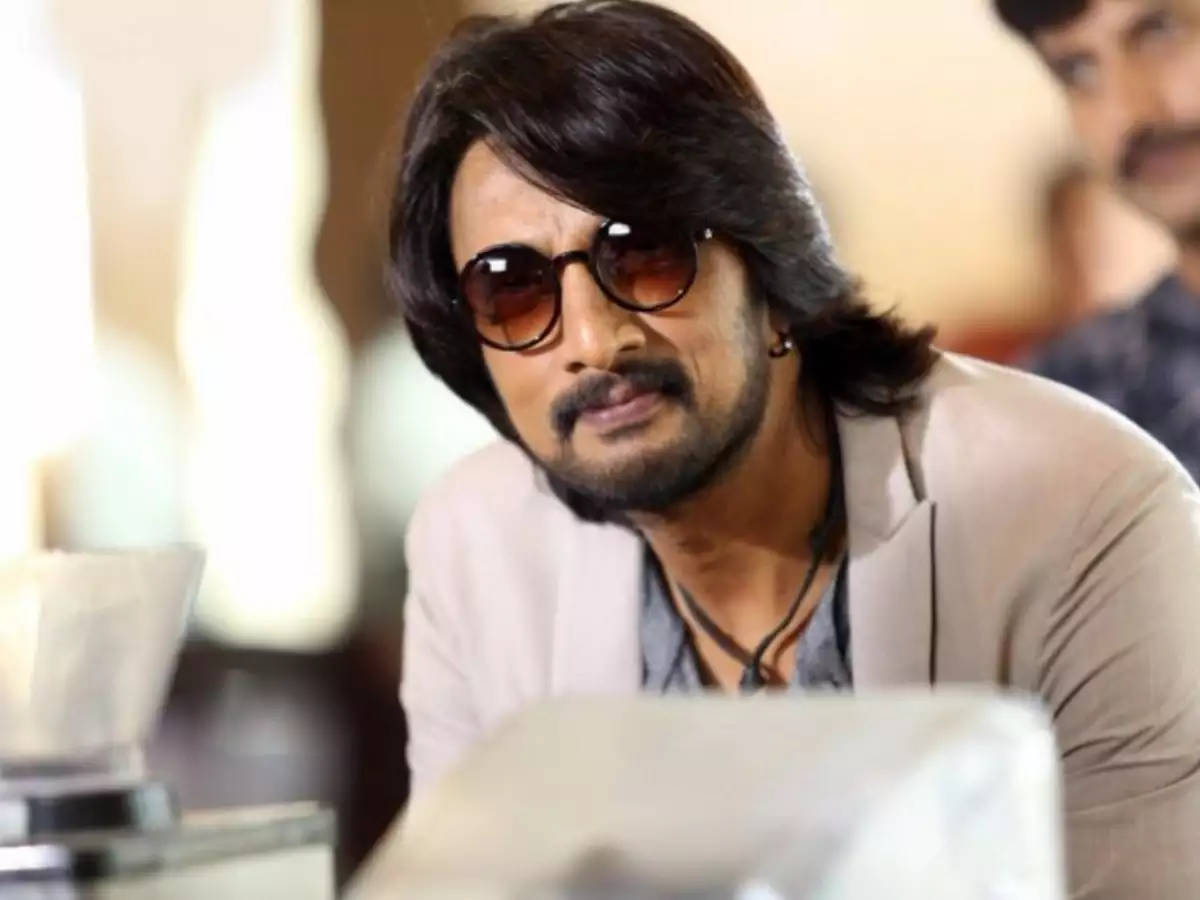 Sudeep With Brown Shades Wallpaper