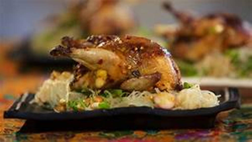 Sumptuous Grilled Quail On A Vegetable Platter Wallpaper