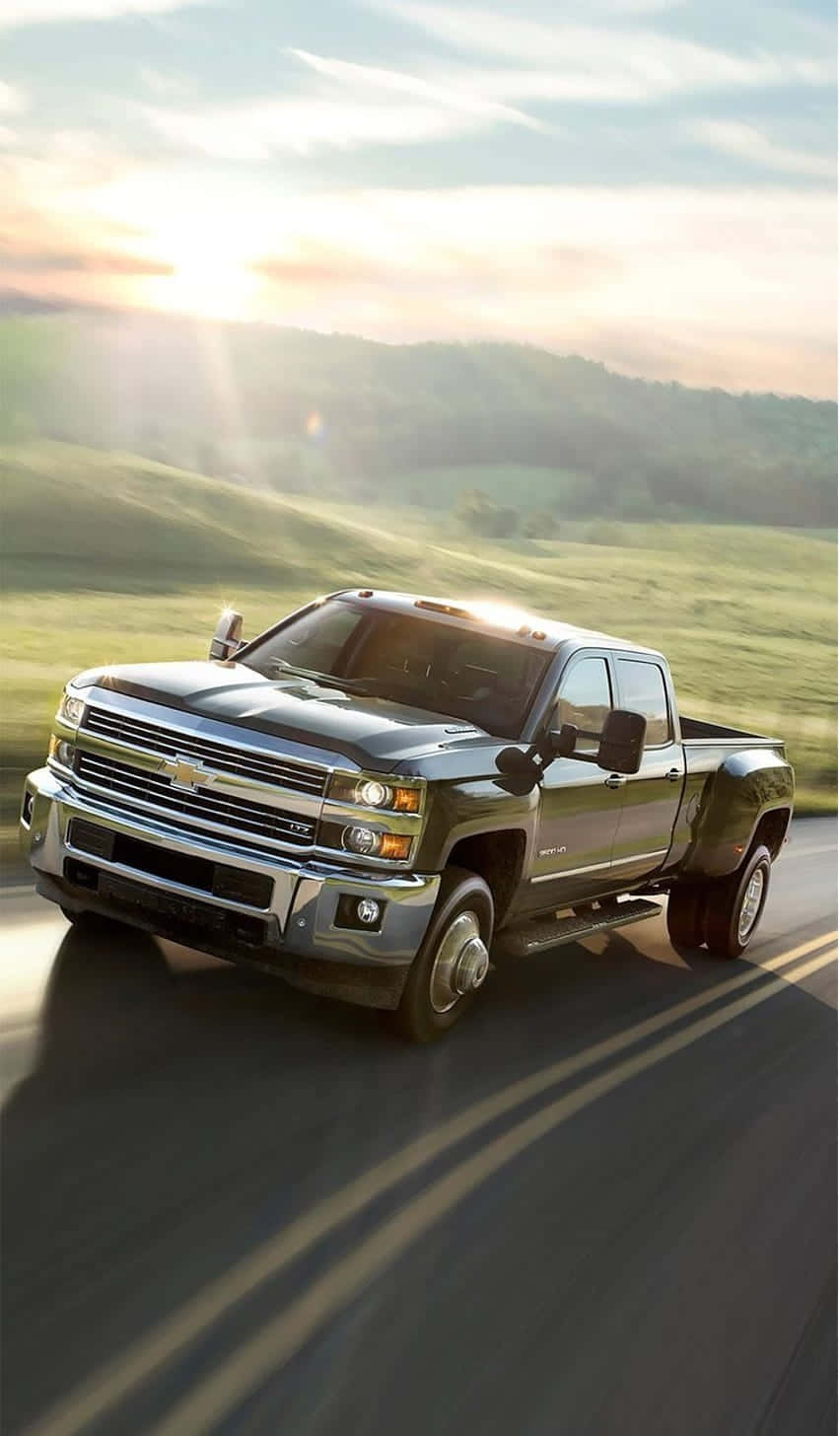 Sunset Cruise Chevrolet Silverado Truck Wallpaper