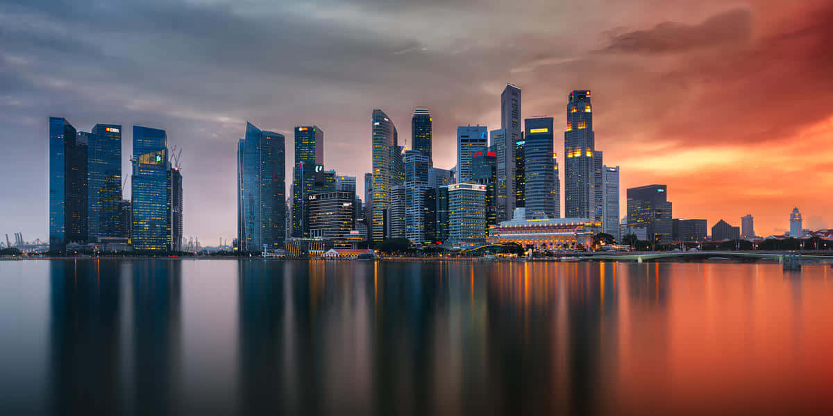 Sunset Skyline Reflections.jpg Wallpaper