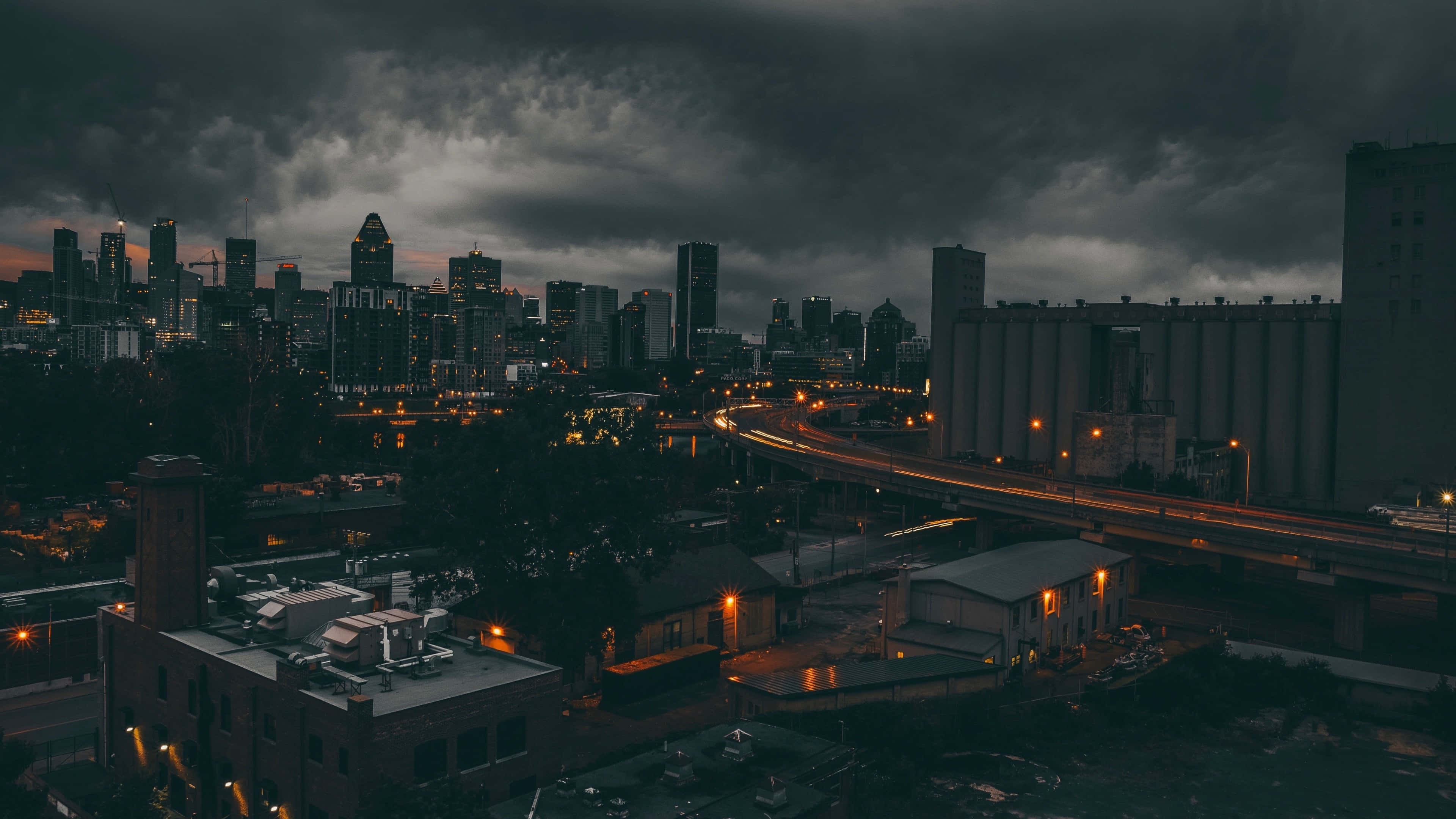 Surreal Vista Of A Bustling Urban Skyline In 4k Resolution Wallpaper