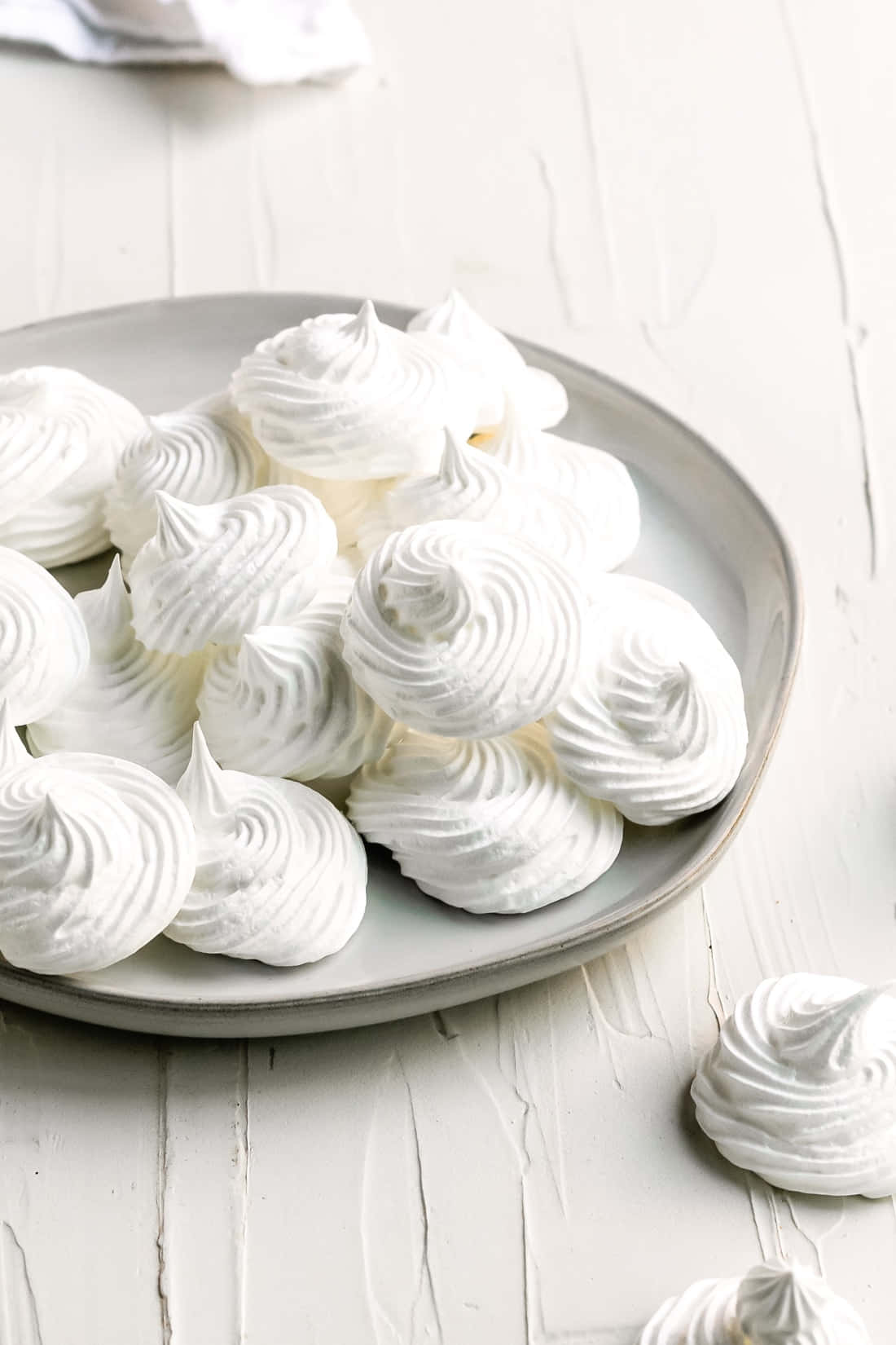 Sweet And Tart Meringue Desserts Deliciously Arranged In A Row. Wallpaper