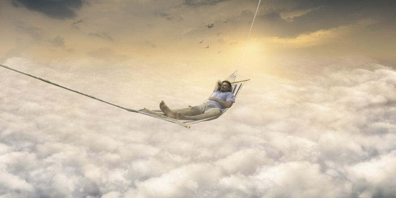 Swinging_ Above_the_ Clouds Wallpaper