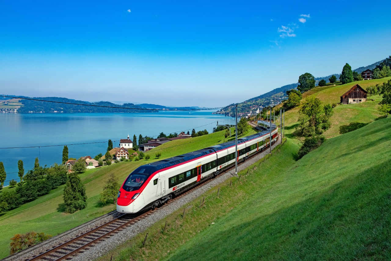 Swiss_ Train_by_ Lake_ Zug Wallpaper